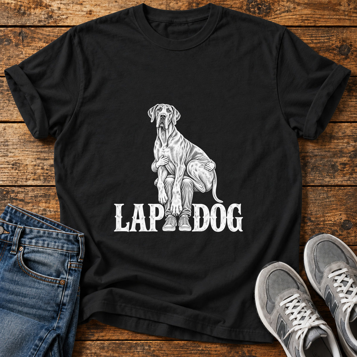 Lap Dog Great Dane graphic T-shirt in Black, shown on a flat-lay shirt mockup