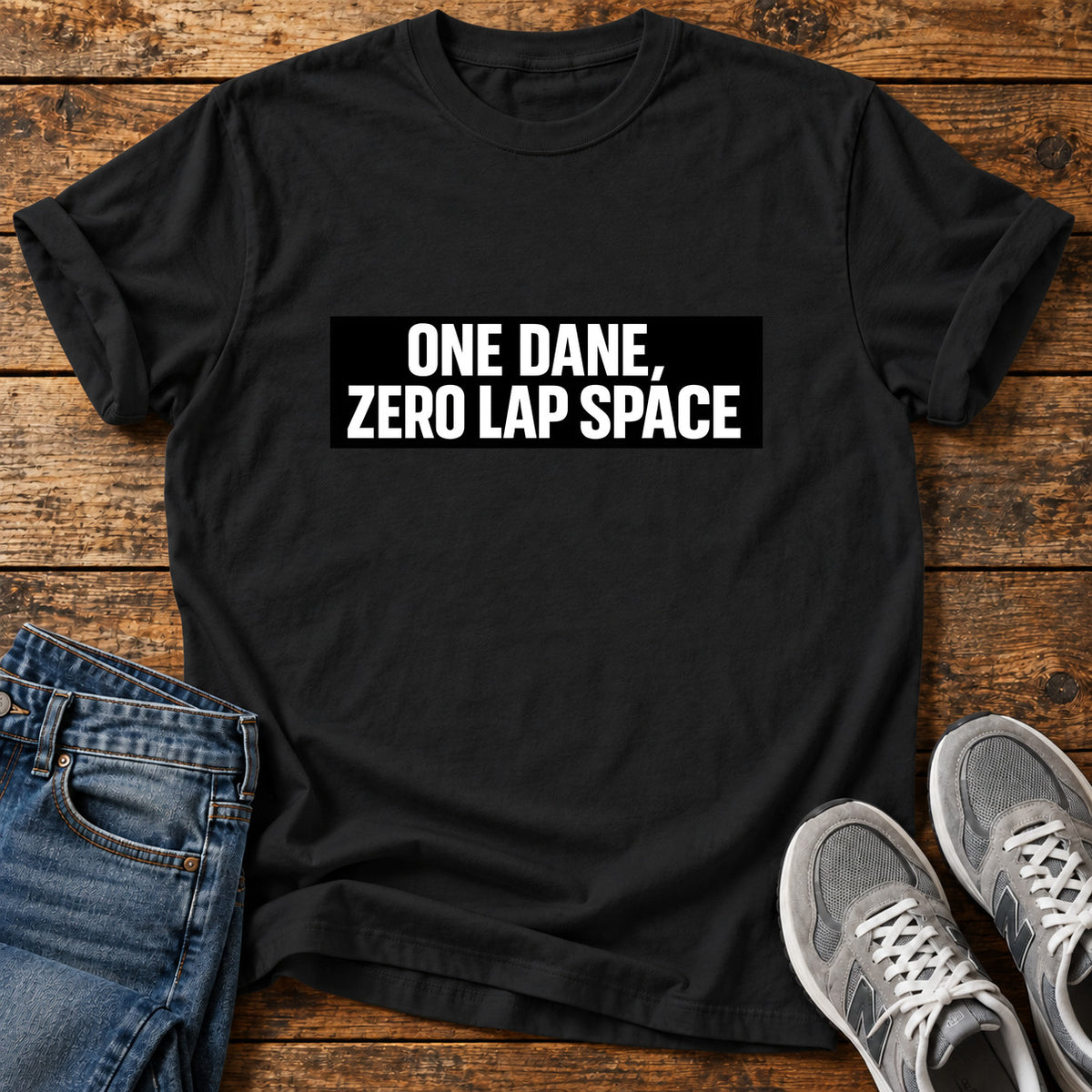 One Dane Zero Great Dane graphic T-shirt in Black, shown on a flat-lay shirt mockup