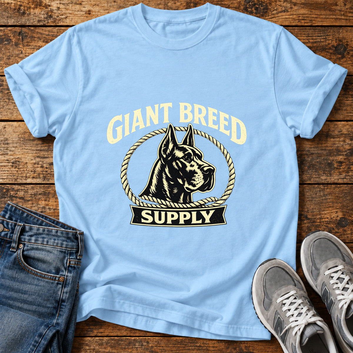 Giant Breed Supply Great Dane graphic T-shirt in Light Blue, shown on a flat-lay shirt mockup