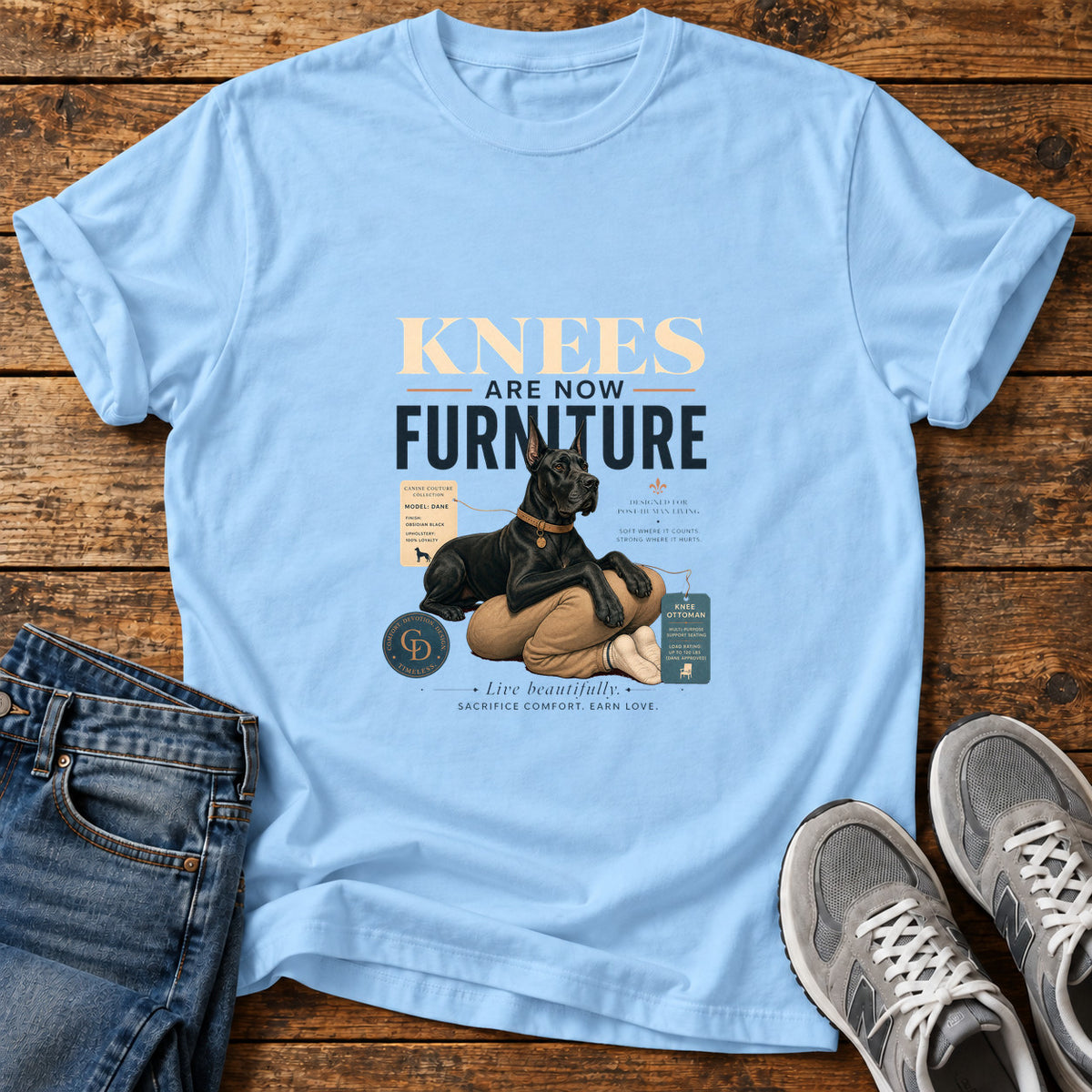 Knees Furniture Great Dane graphic T-shirt in Light Blue, shown on a flat-lay shirt mockup