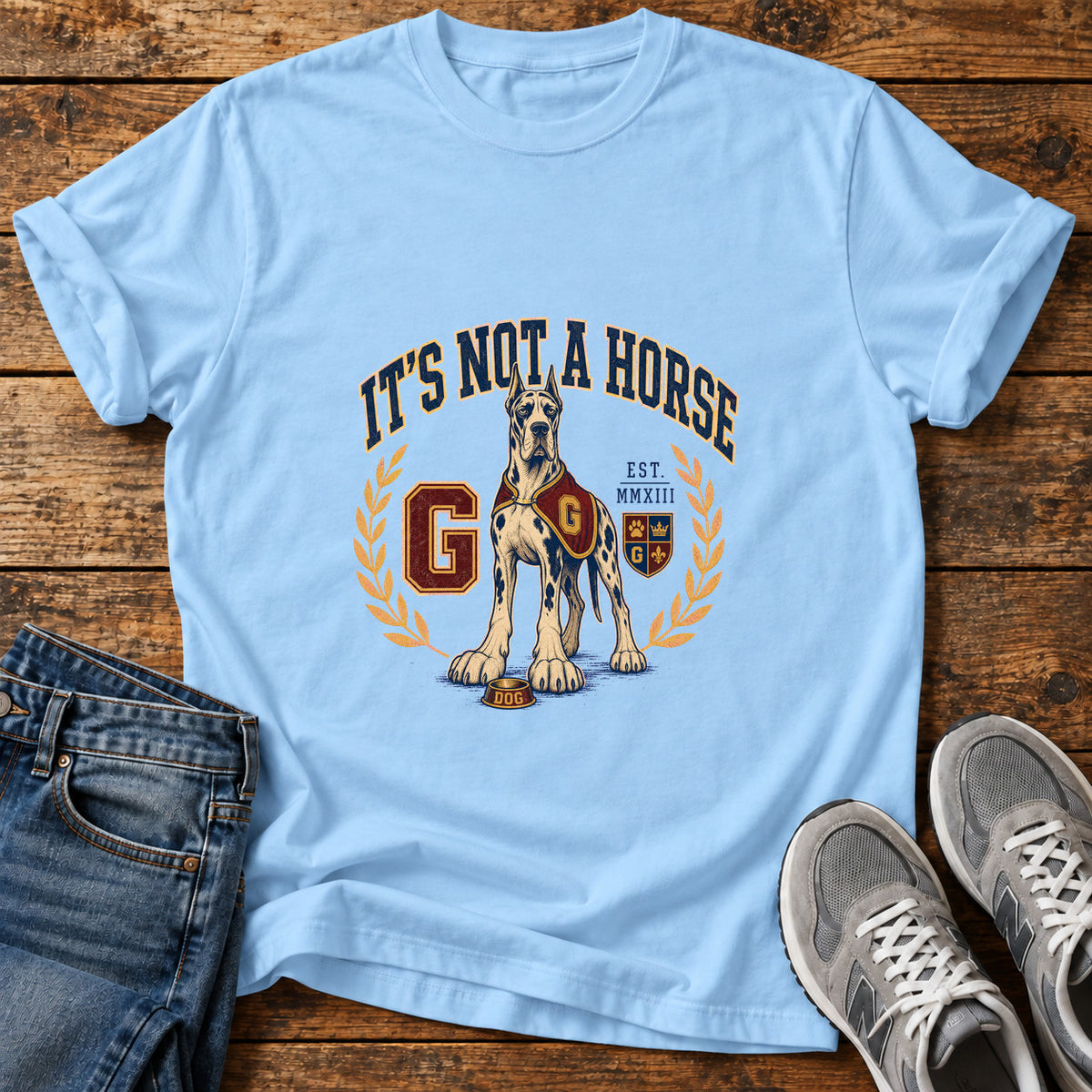 It's Not A Great Dane graphic T-shirt in Light Blue, shown on a flat-lay shirt mockup