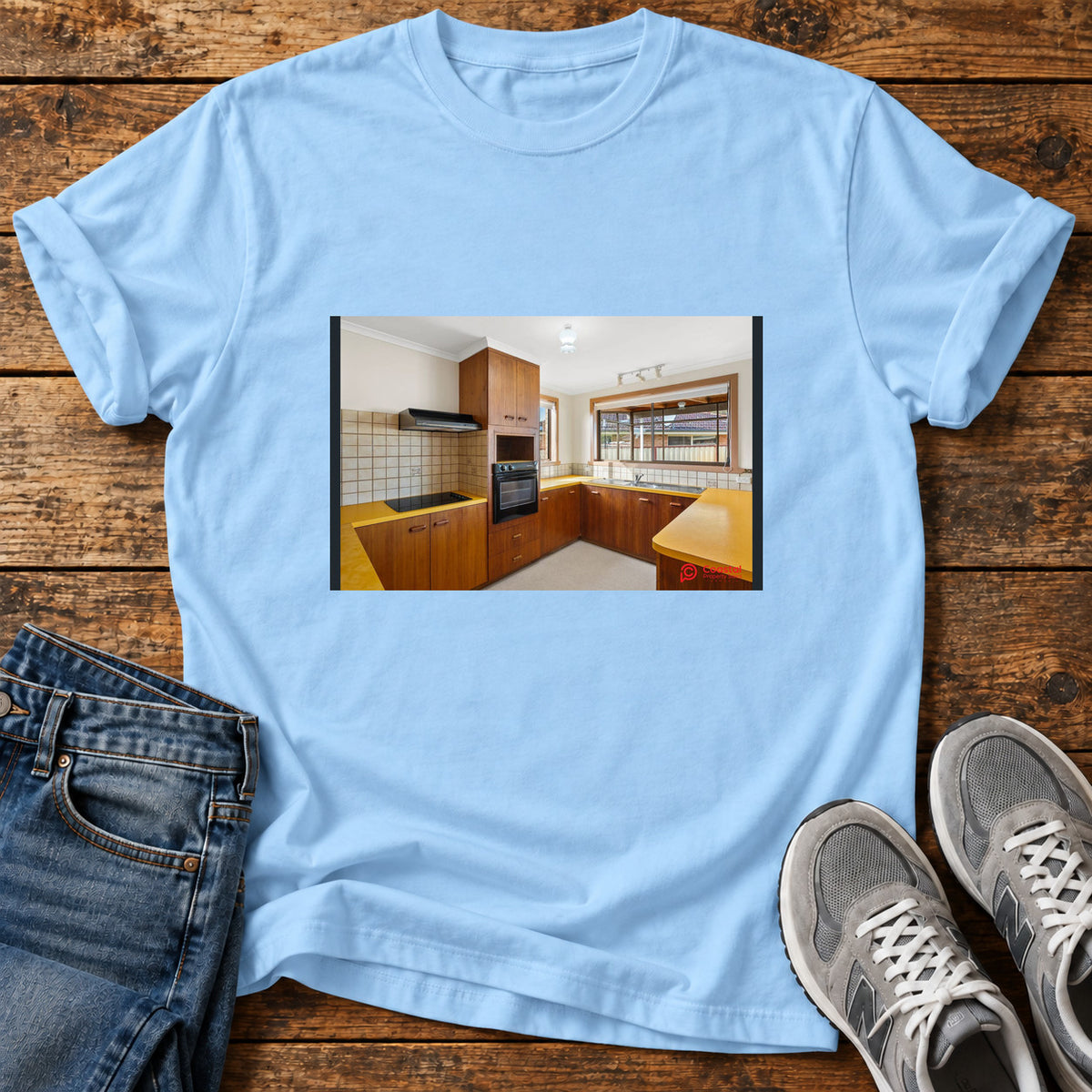 Retro Kitchen Great Dane graphic T-shirt in Light Blue, shown on a flat-lay shirt mockup