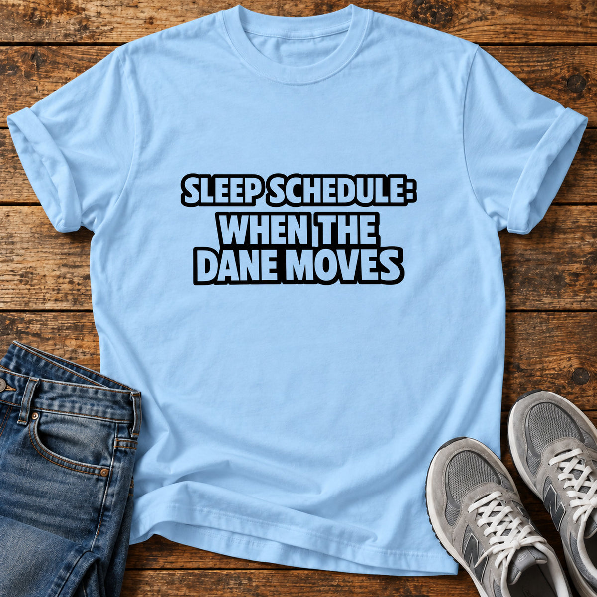 Sleep Schedule Great Dane graphic T-shirt in Light Blue, shown on a flat-lay shirt mockup