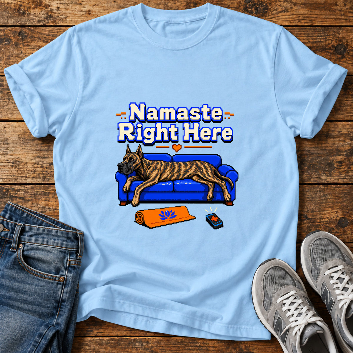 Namaste Right Here Great Dane graphic T-shirt in Light Blue, shown on a flat-lay shirt mockup