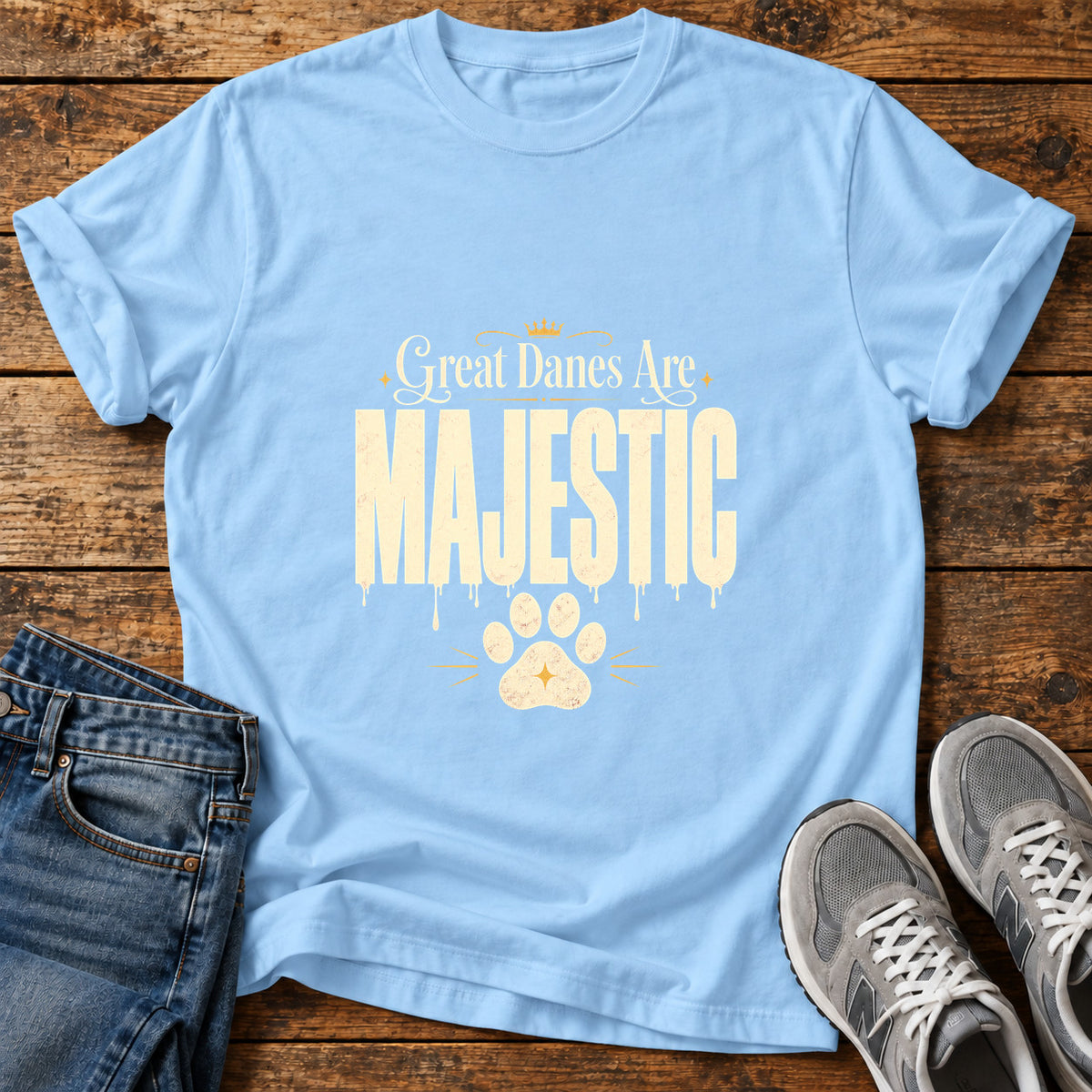 Majestic Danes Great Dane graphic T-shirt in Light Blue, shown on a flat-lay shirt mockup