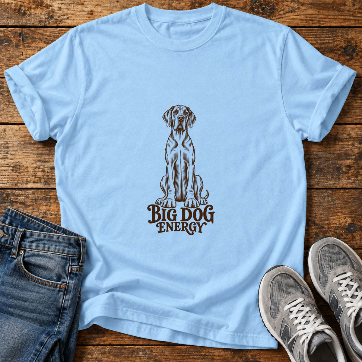 Big Dog Energy Great Dane graphic T-shirt in Light Blue, shown on a flat-lay shirt mockup