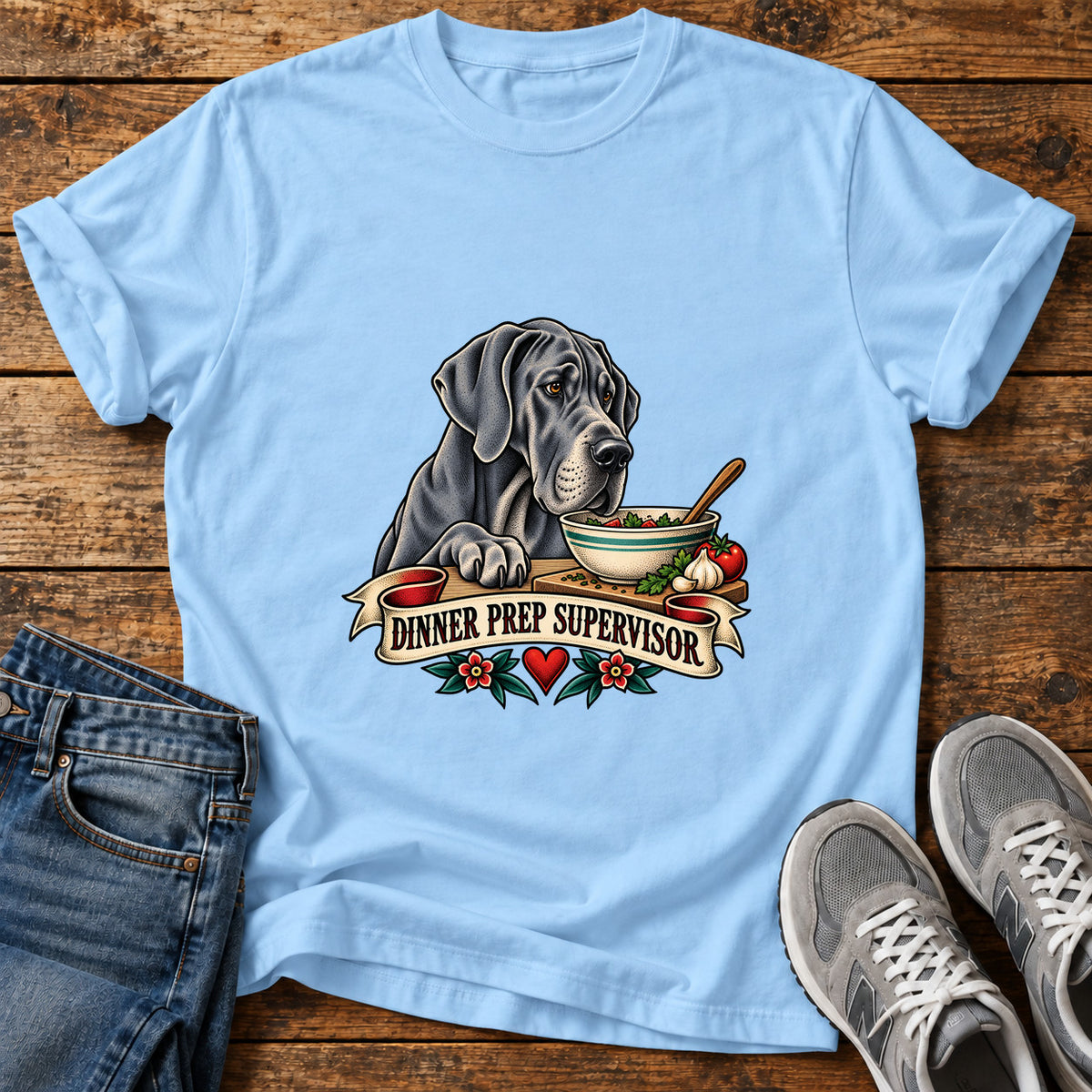 Dinner Prep Supervisor Great Dane graphic T-shirt in Light Blue, shown on a flat-lay shirt mockup