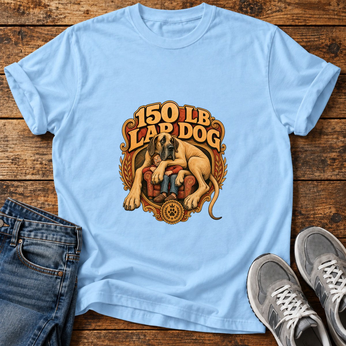 150 Lb Lapdog Great Dane graphic T-shirt in Light Blue, shown on a flat-lay shirt mockup