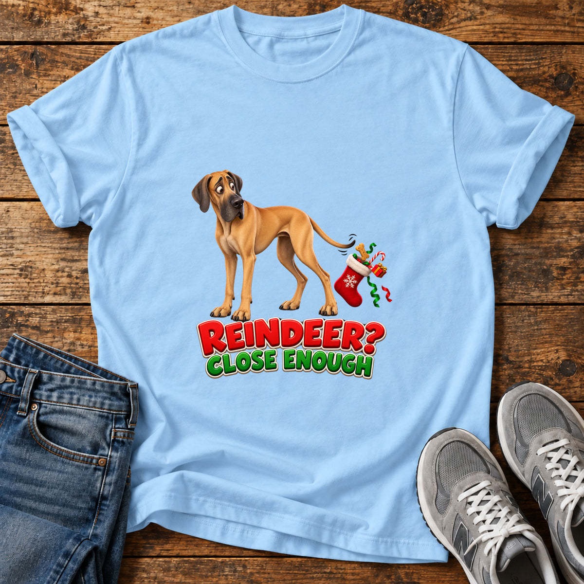 Reindeer Close Enough Great Dane graphic T-shirt in Light Blue, shown on a flat-lay shirt mockup