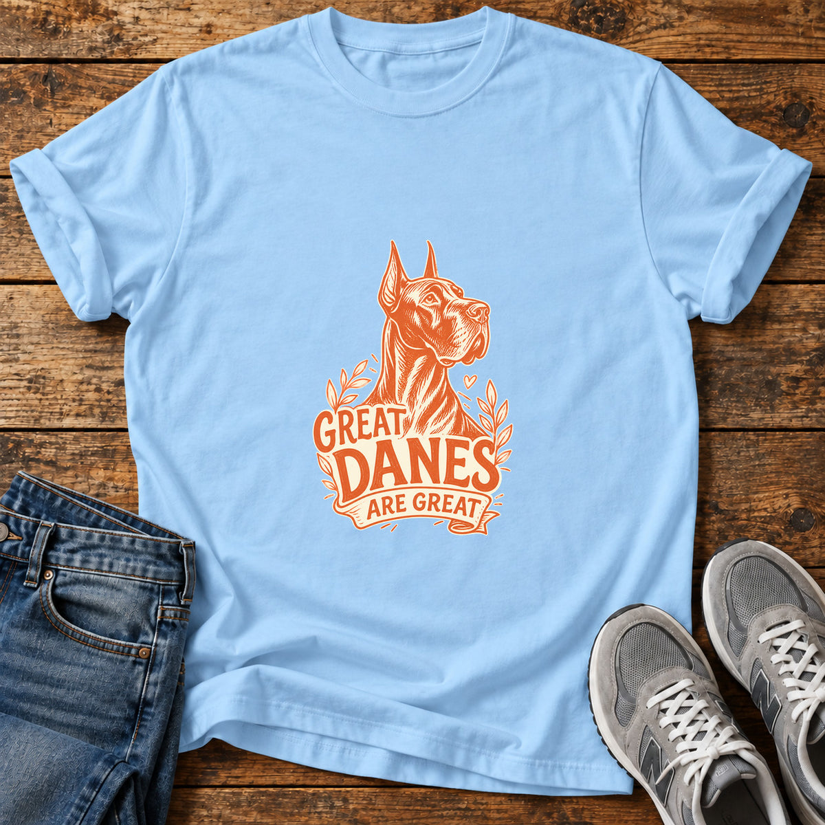 Great Danes Great graphic T-shirt in Light Blue, shown on a flat-lay shirt mockup
