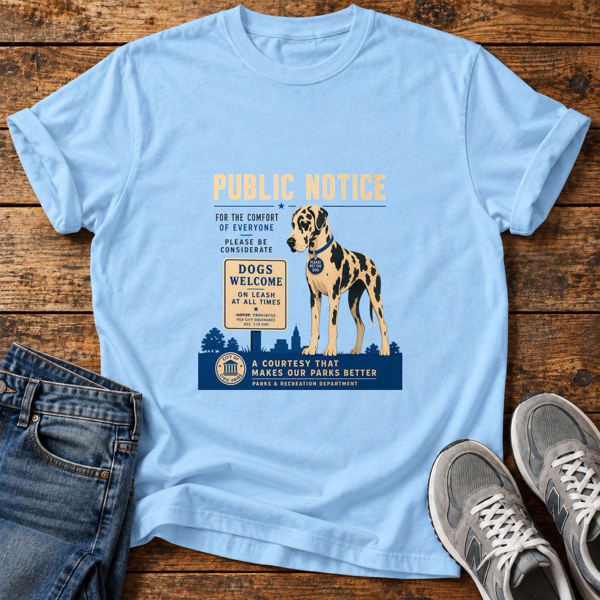 Public Notice Dog Great Dane graphic T-shirt in Light Blue, shown on a flat-lay shirt mockup
