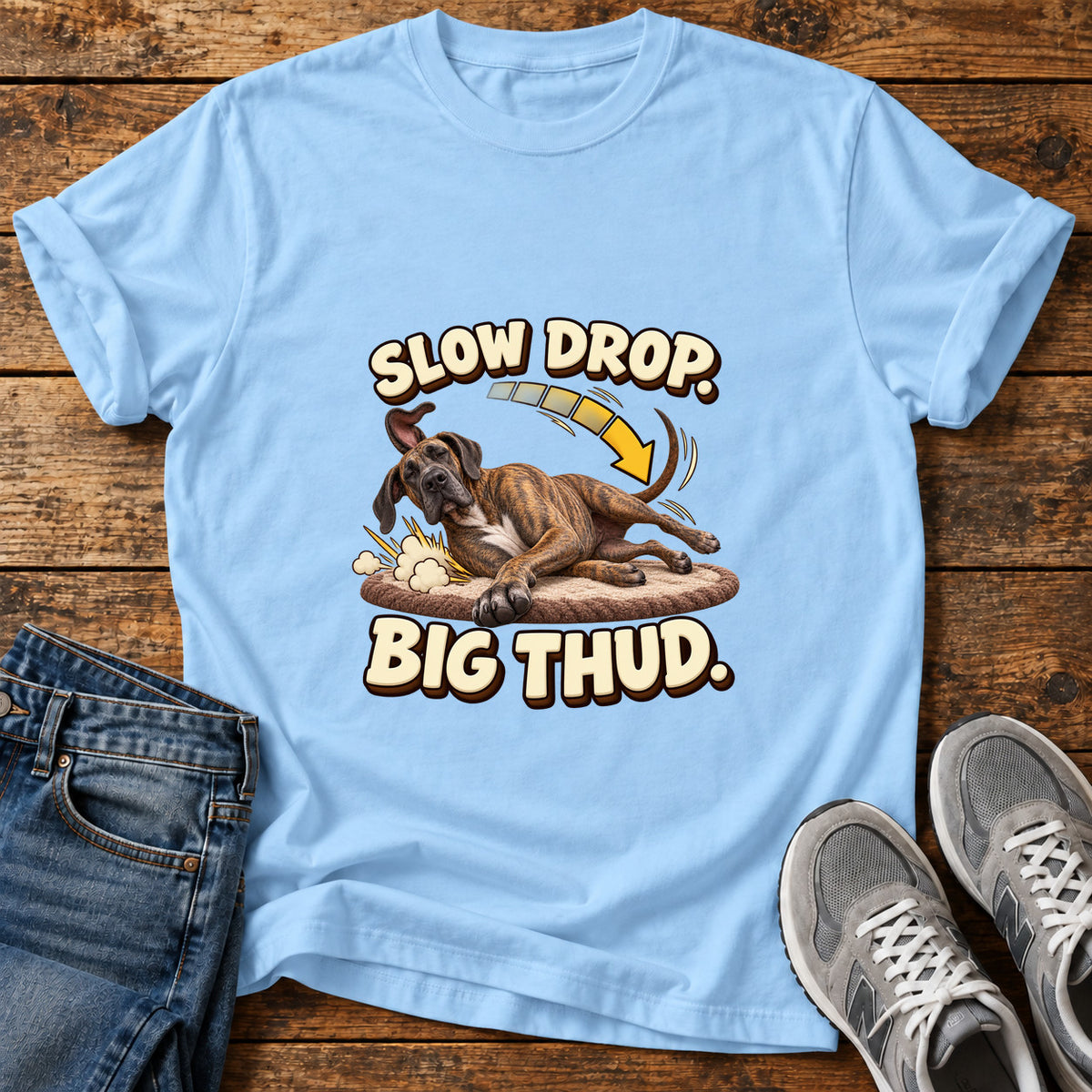 Slow Drop Great Dane graphic T-shirt in Light Blue, shown on a flat-lay shirt mockup