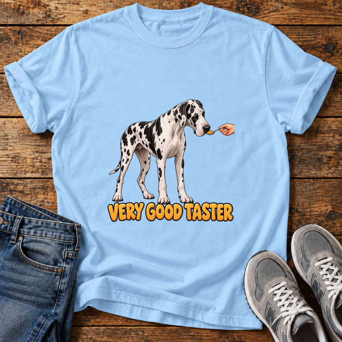 Very Good Taster Great Dane graphic T-shirt in Light Blue, shown on a flat-lay shirt mockup