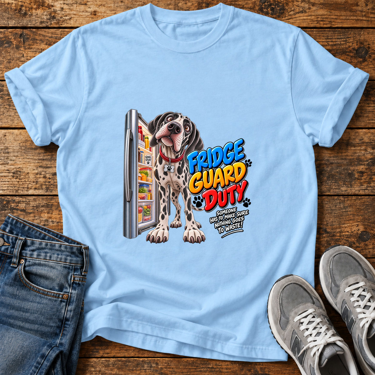 Fridge Guard Duty Great Dane graphic T-shirt in Light Blue, shown on a flat-lay shirt mockup