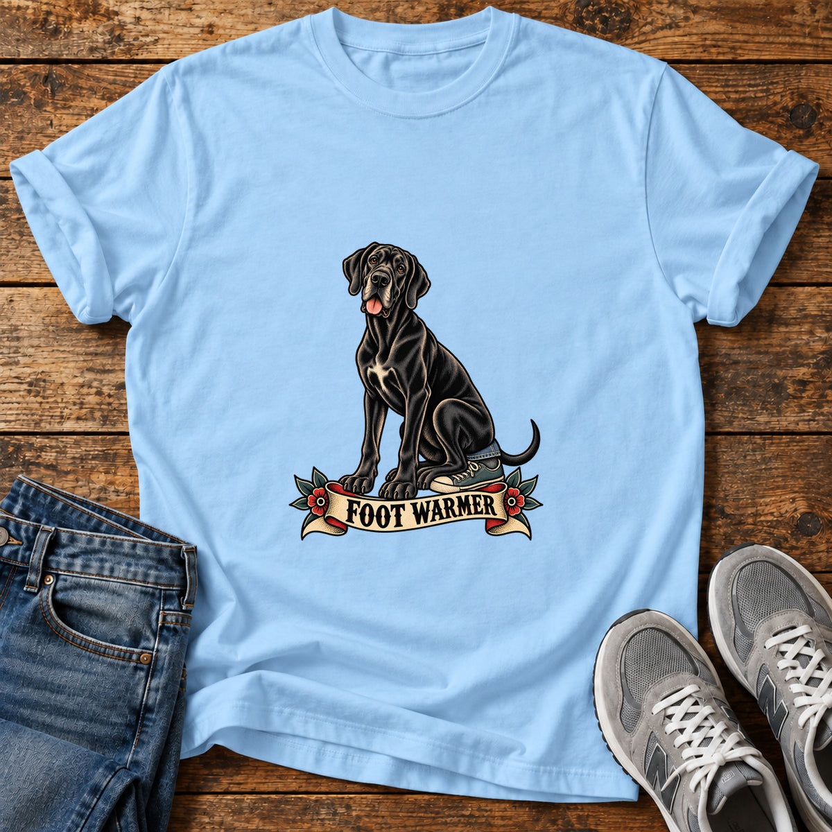 Foot Warmer Great Dane graphic T-shirt in Light Blue, shown on a flat-lay shirt mockup