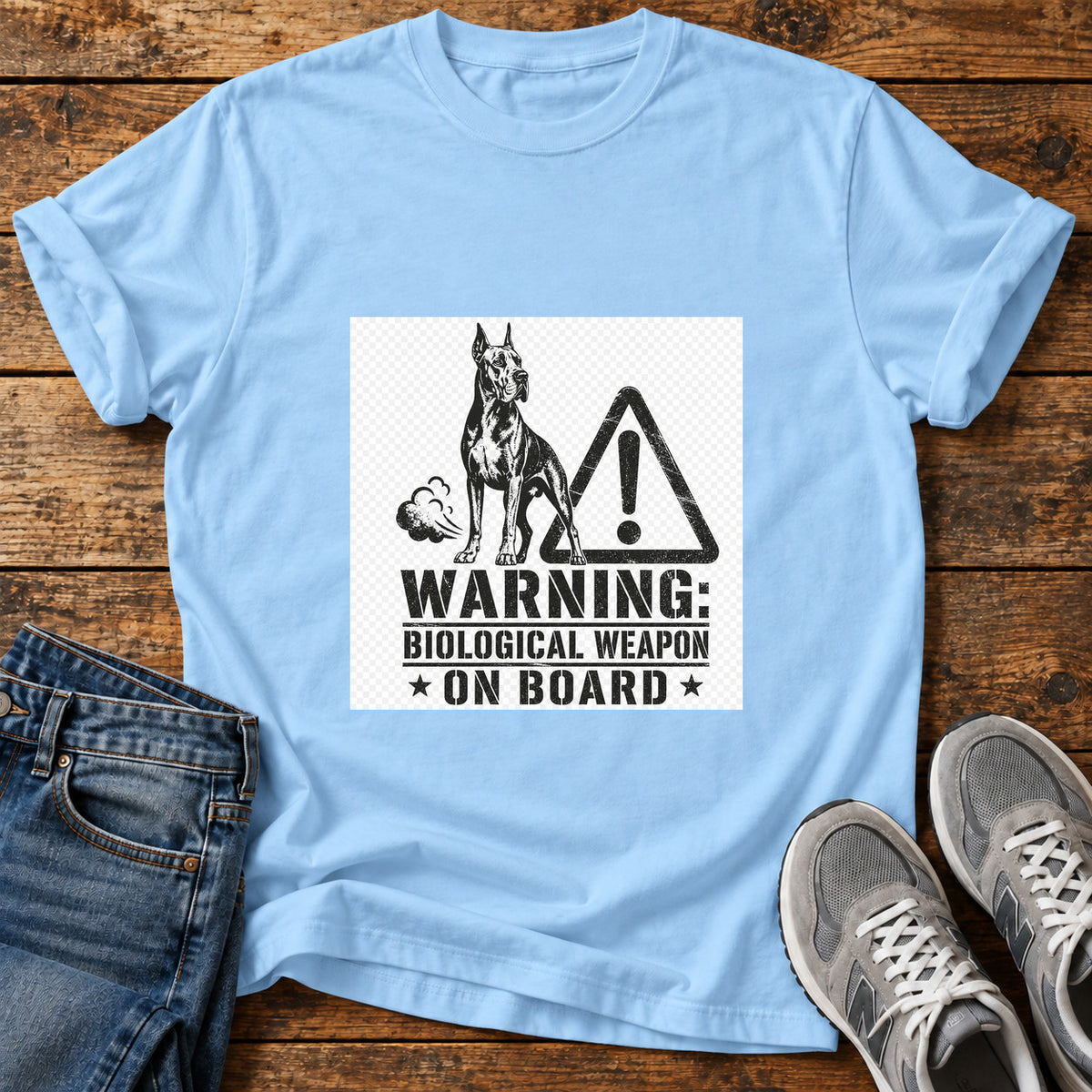Biological Weapon Warning Great Dane graphic T-shirt in Light Blue, shown on a flat-lay shirt mockup
