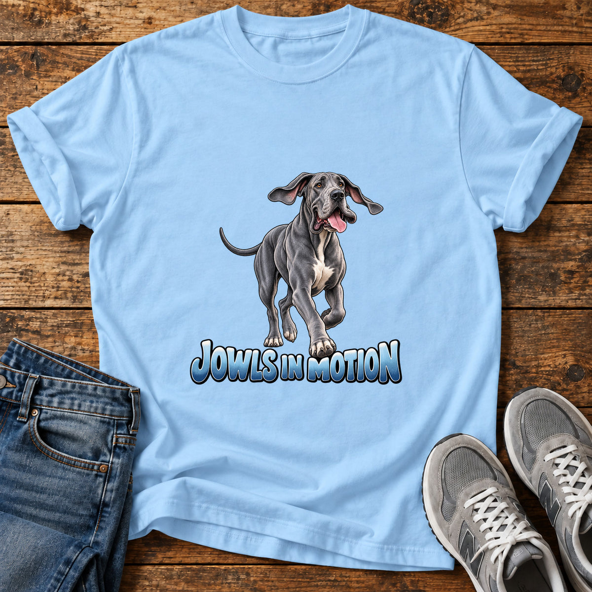 Jowls In Motion Great Dane graphic T-shirt in Light Blue, shown on a flat-lay shirt mockup