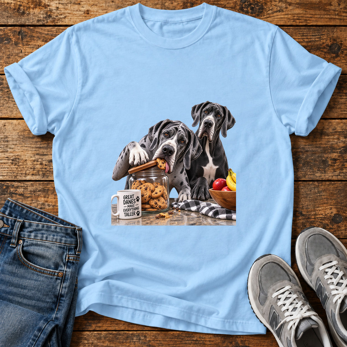 Great Danes Taller graphic T-shirt in Light Blue, shown on a flat-lay shirt mockup