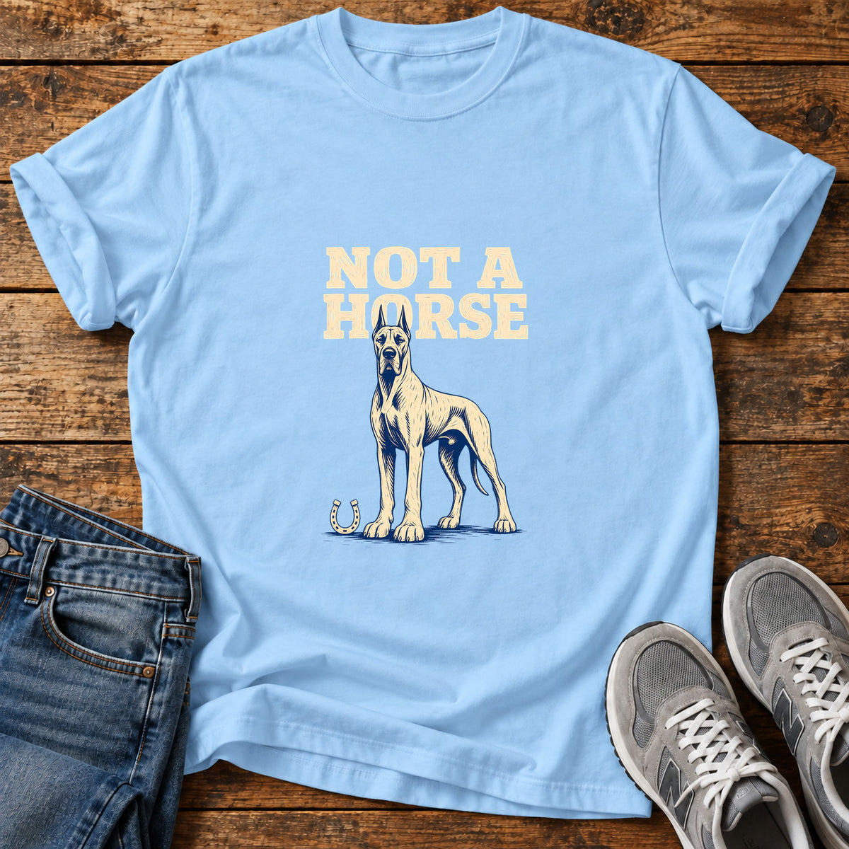 Not A Horse Great Dane graphic T-shirt in Light Blue, shown on a flat-lay shirt mockup