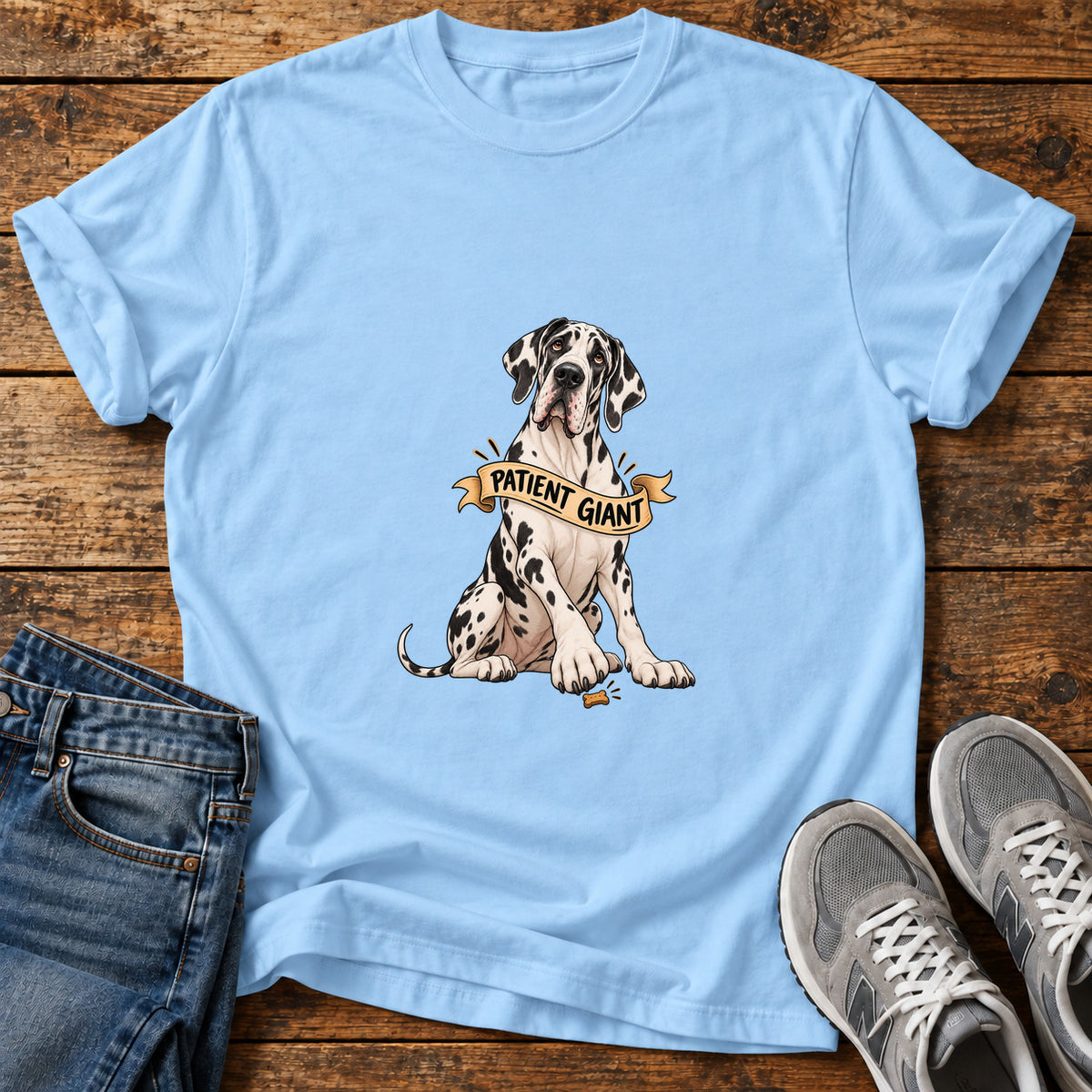 Patient Giant Great Dane graphic T-shirt in Light Blue, shown on a flat-lay shirt mockup