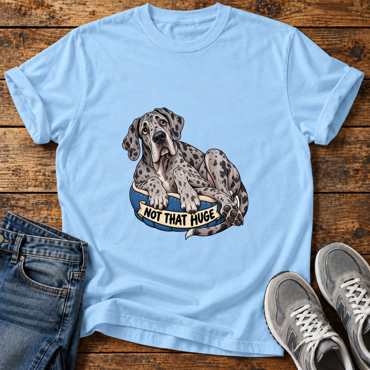 Not That Huge Great Dane graphic T-shirt in Light Blue, shown on a flat-lay shirt mockup