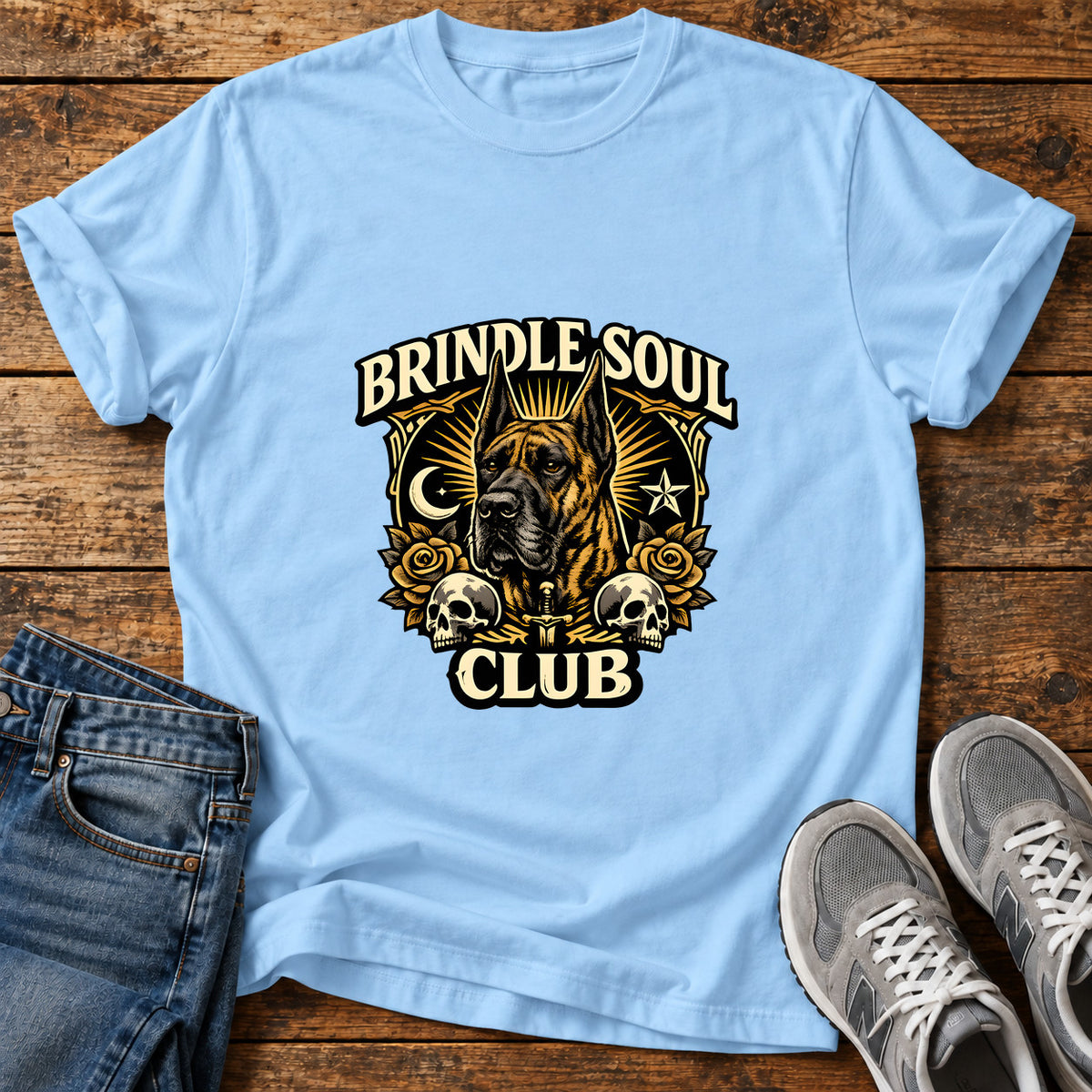Brindle Soul Club Great Dane graphic T-shirt in Light Blue, shown on a flat-lay shirt mockup