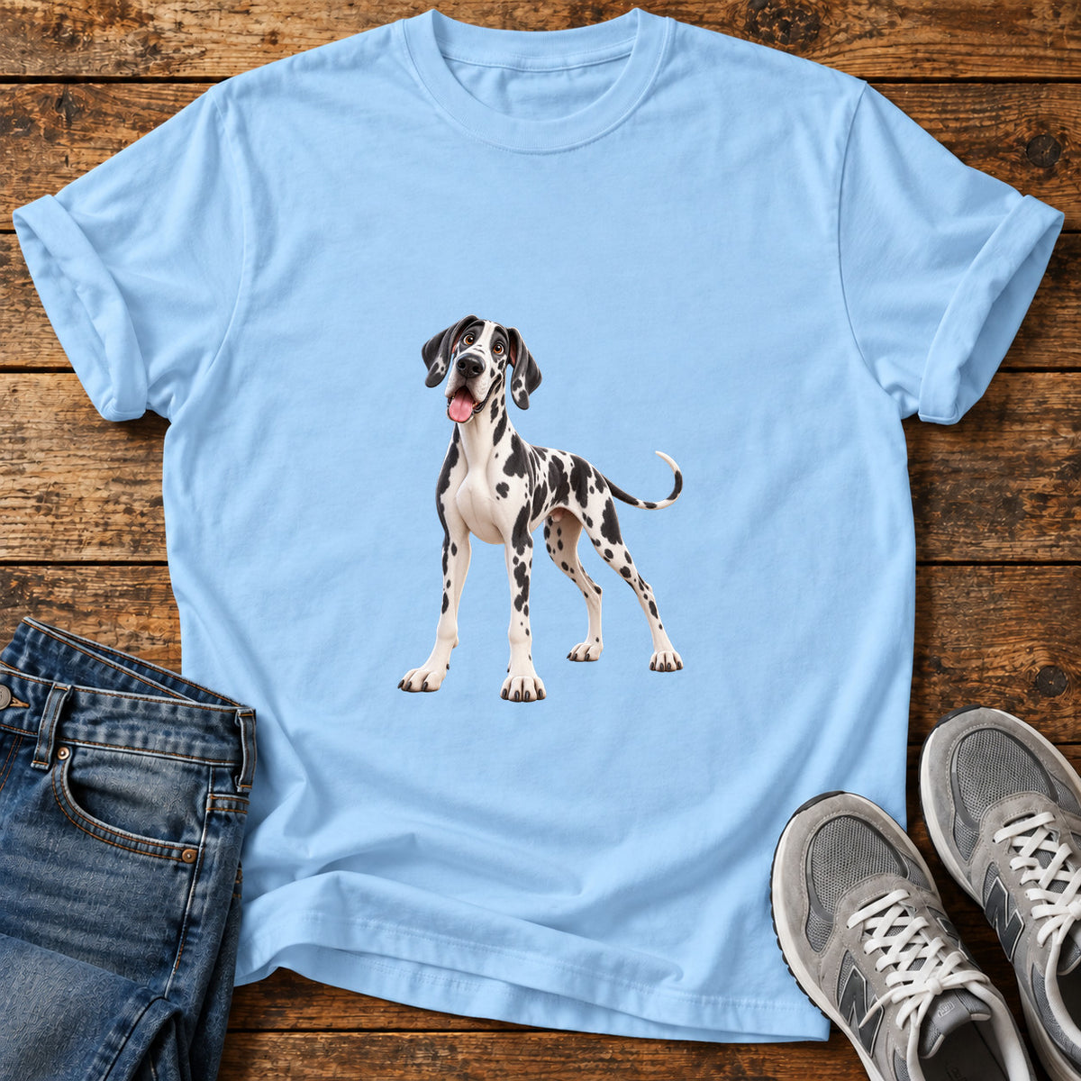 Spotty Pup Great Dane graphic T-shirt in Light Blue, shown on a flat-lay shirt mockup