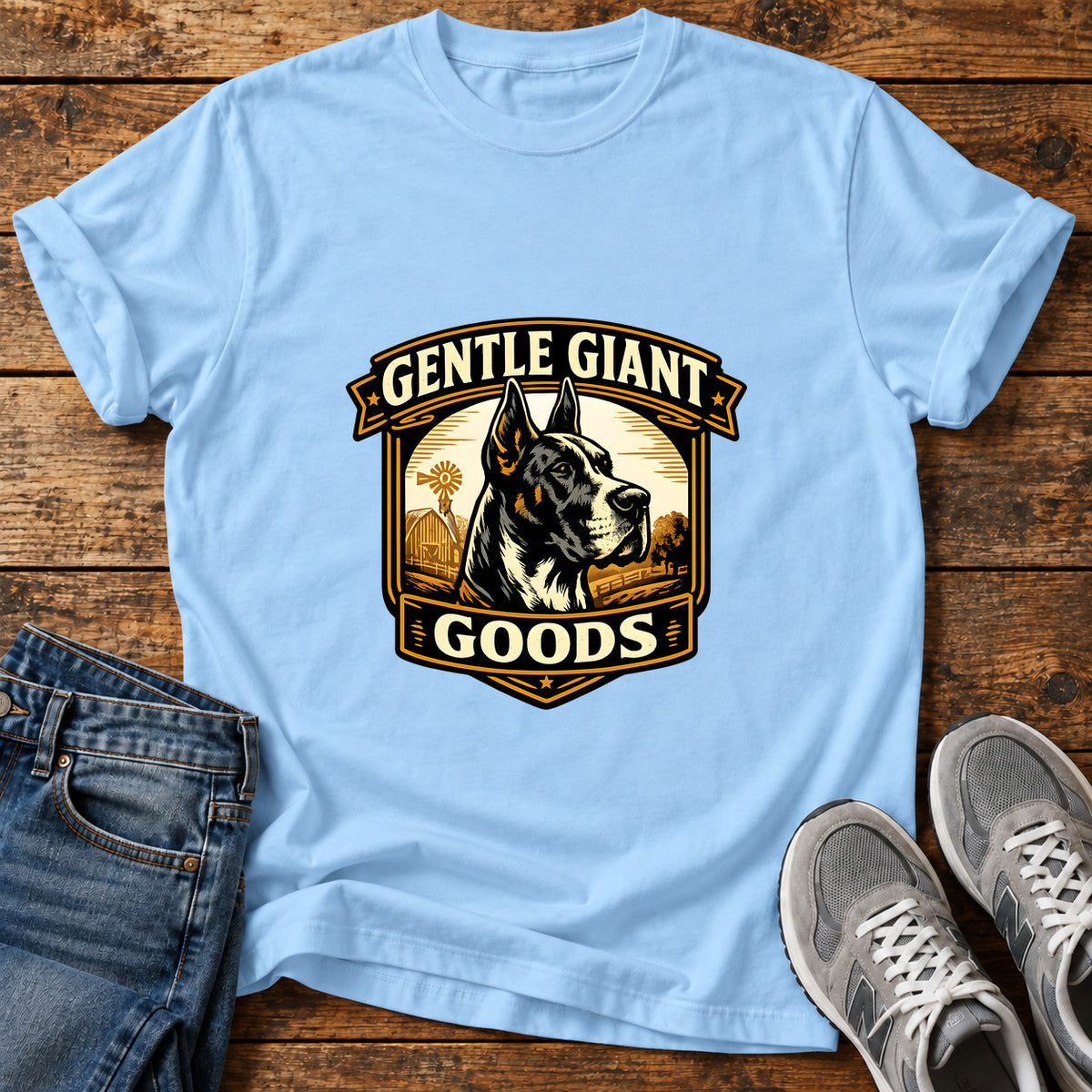 Gentle Giant Goods Great Dane graphic T-shirt in Light Blue, shown on a flat-lay shirt mockup