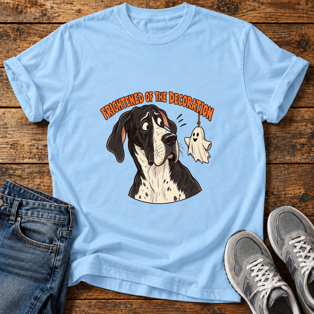 Frightened Decoration Great Dane graphic T-shirt in Light Blue, shown on a flat-lay shirt mockup