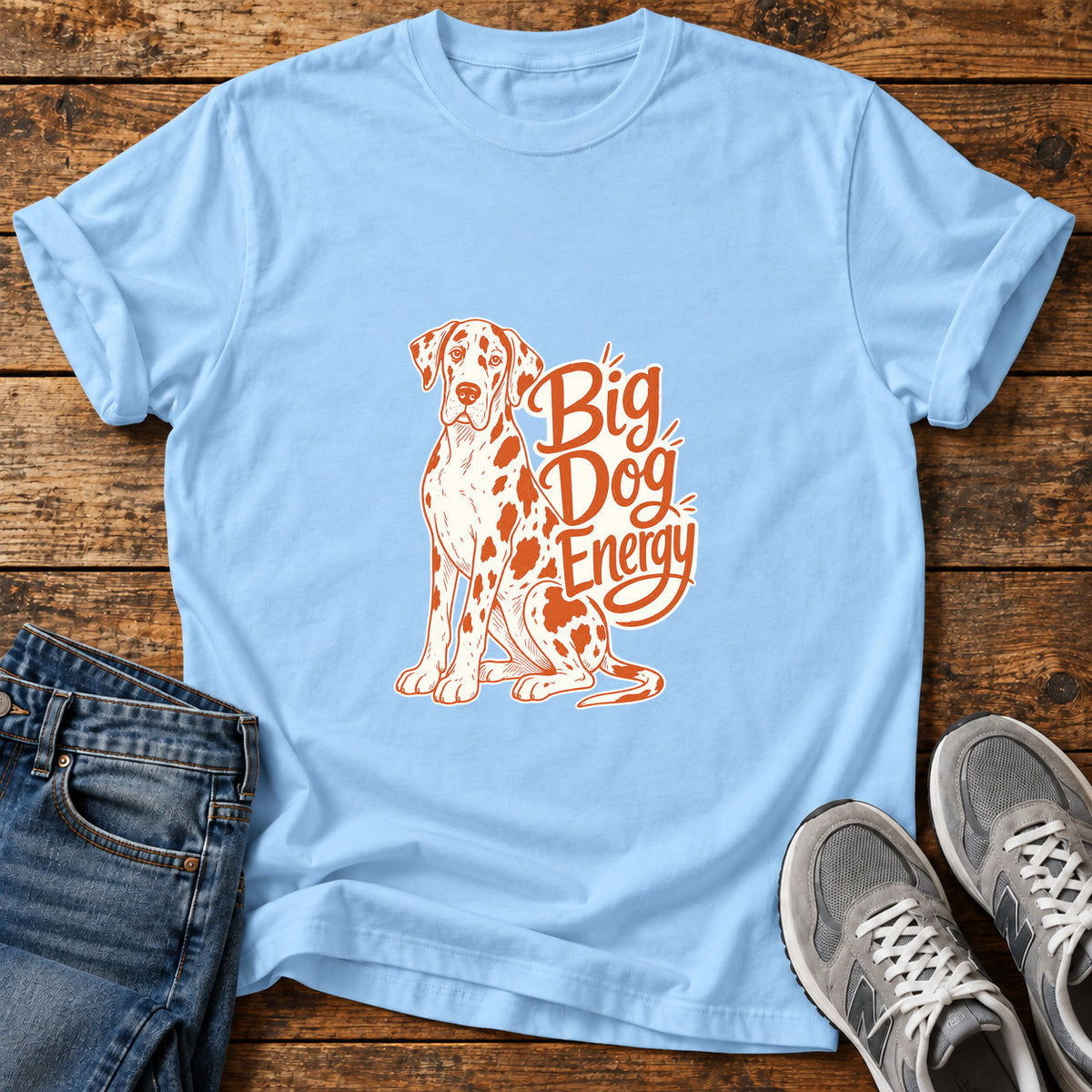 Big Dog Energy Great Dane graphic T-shirt in Light Blue, shown on a flat-lay shirt mockup