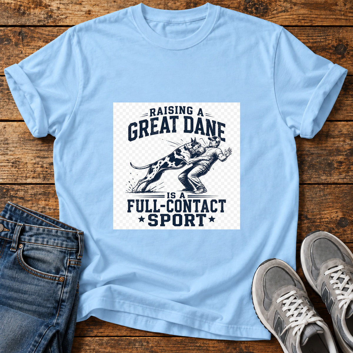 Great Dane Sport graphic T-shirt in Light Blue, shown on a flat-lay shirt mockup