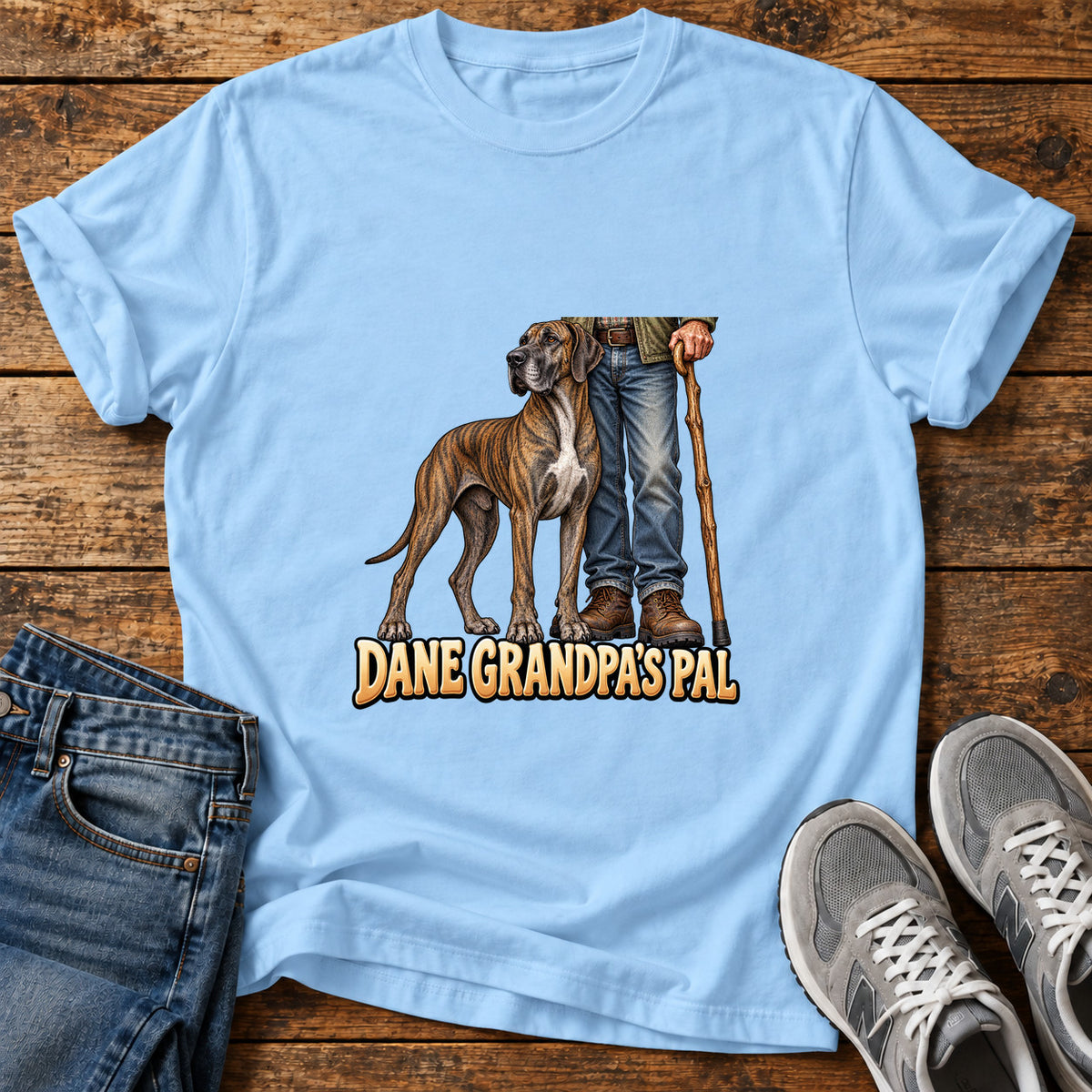 Dane Grandpa's Pal Great Dane graphic T-shirt in Light Blue, shown on a flat-lay shirt mockup