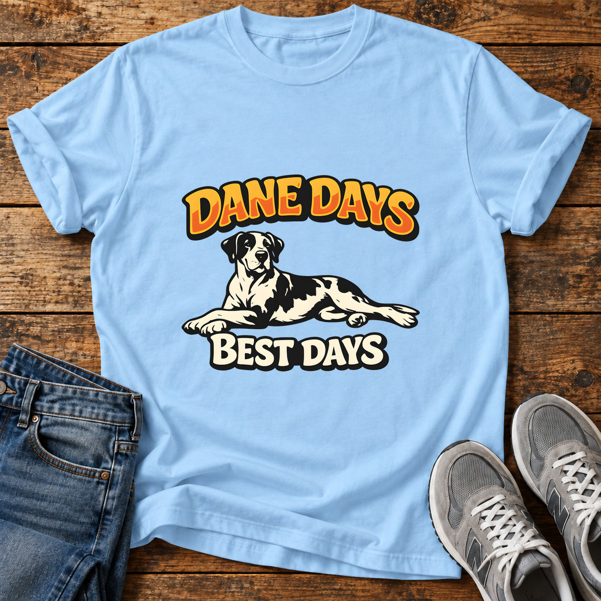 Dane Days Great Dane graphic T-shirt in Light Blue, shown on a flat-lay shirt mockup