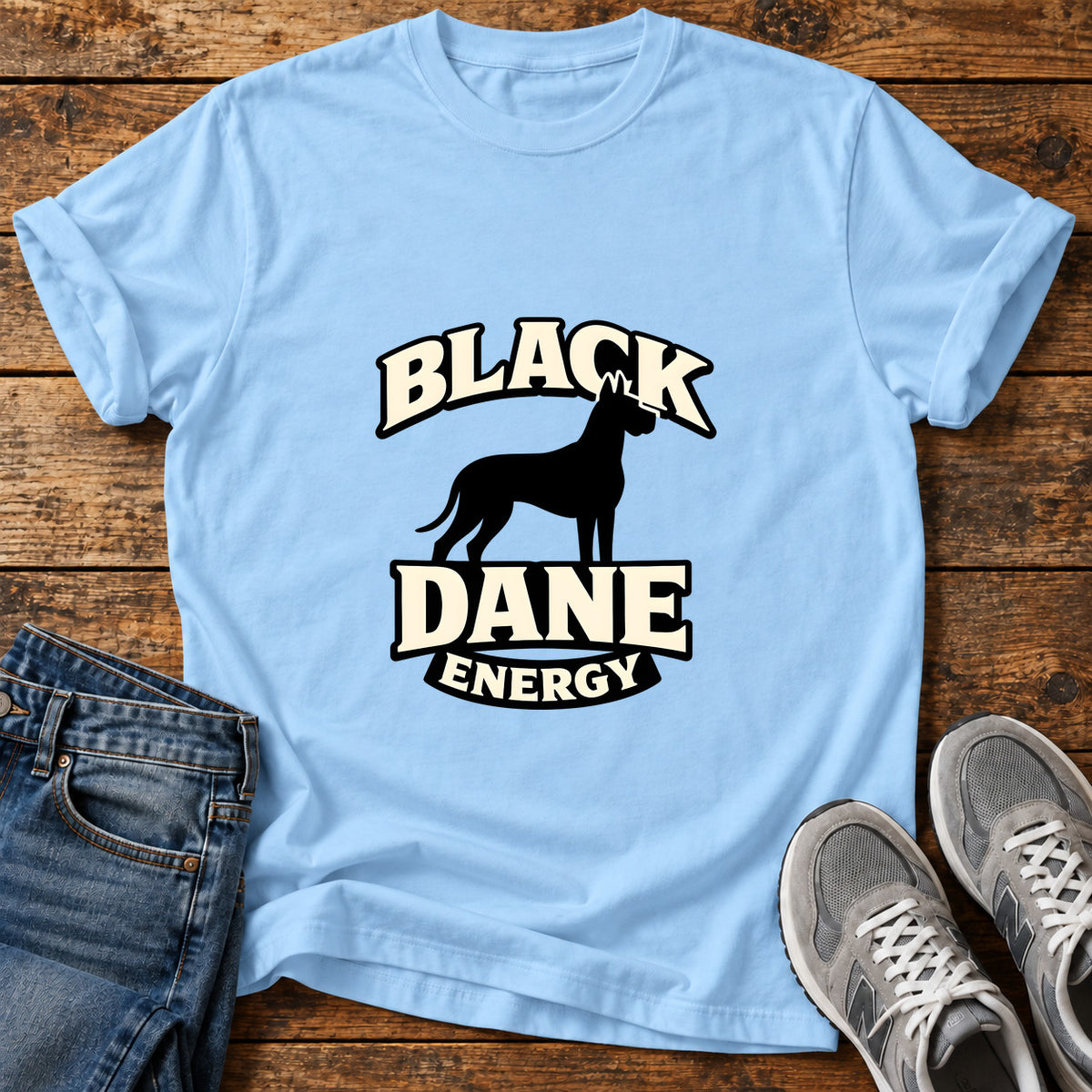 Black Dane Energy Great Dane graphic T-shirt in Light Blue, shown on a flat-lay shirt mockup