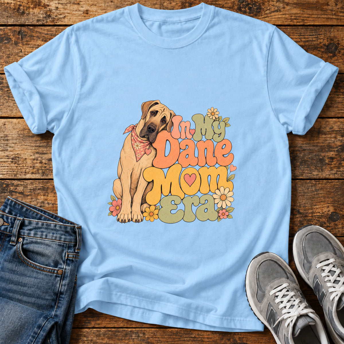 Dane Mom Era Great Dane graphic T-shirt in Light Blue, shown on a flat-lay shirt mockup