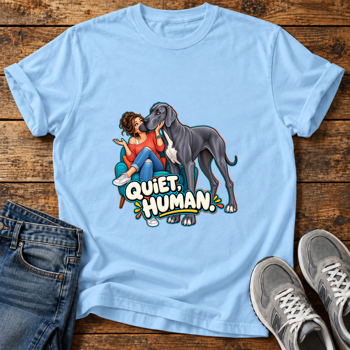 Quiet Human Great Dane graphic T-shirt in Light Blue, shown on a flat-lay shirt mockup