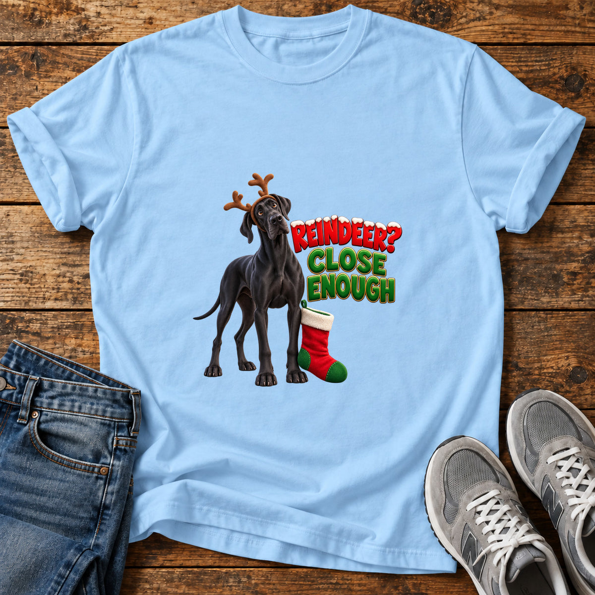 Reindeer Close Enough Great Dane graphic T-shirt in Light Blue, shown on a flat-lay shirt mockup