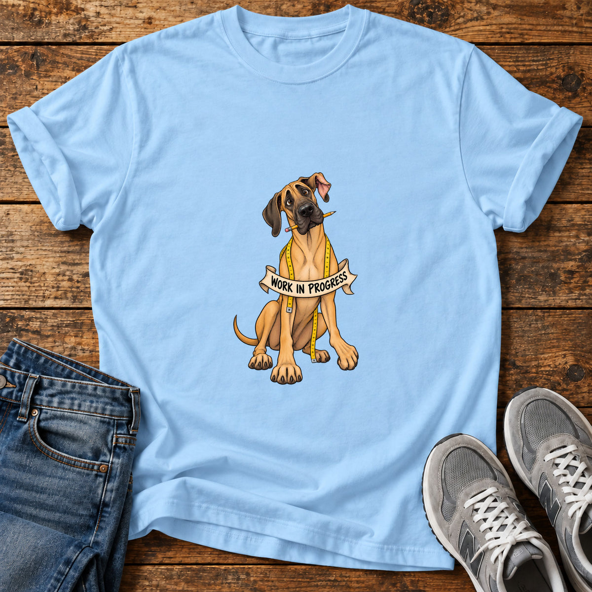 Work In Progress Great Dane graphic T-shirt in Light Blue, shown on a flat-lay shirt mockup