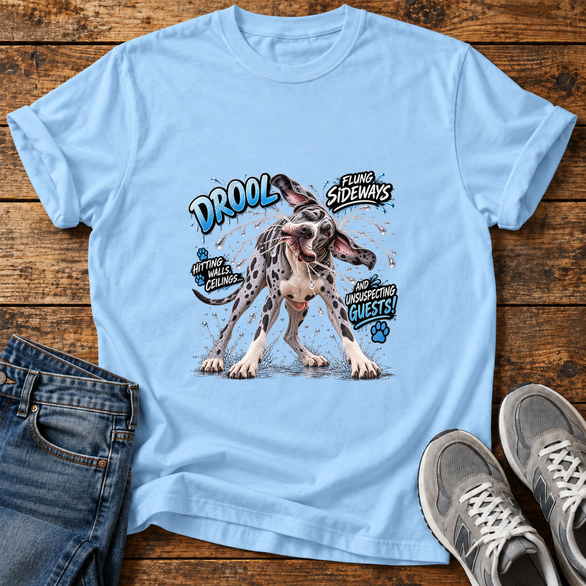 Drool Sideways Great Dane graphic T-shirt in Light Blue, shown on a flat-lay shirt mockup