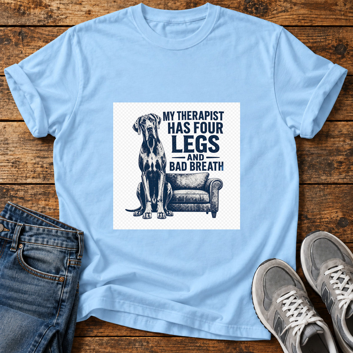 Four Leg Therapist Great Dane graphic T-shirt in Light Blue, shown on a flat-lay shirt mockup