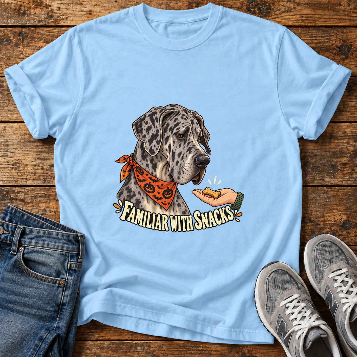 Familiar Snacks Great Dane graphic T-shirt in Light Blue, shown on a flat-lay shirt mockup