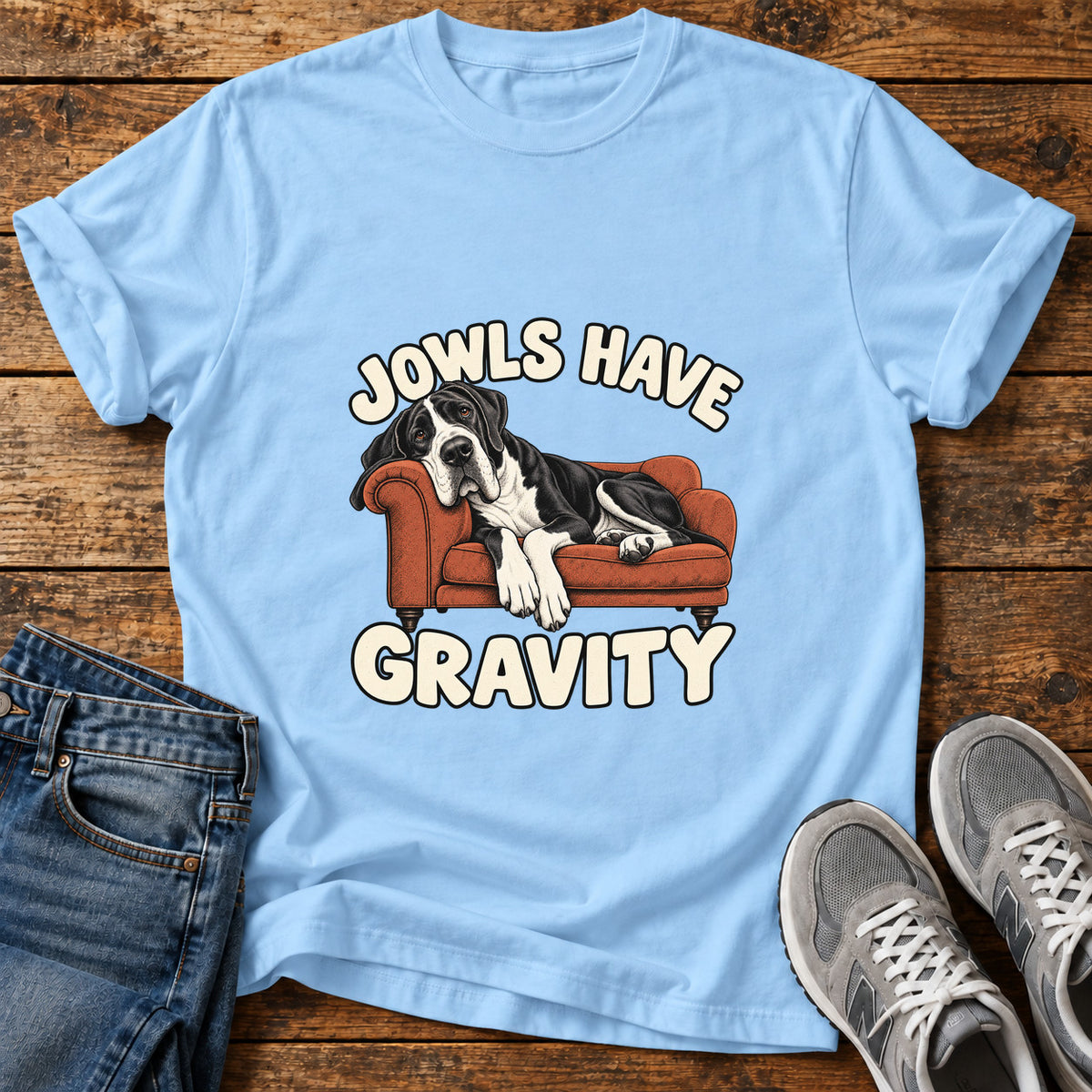 Jowls Gravity Great Dane graphic T-shirt in Light Blue, shown on a flat-lay shirt mockup