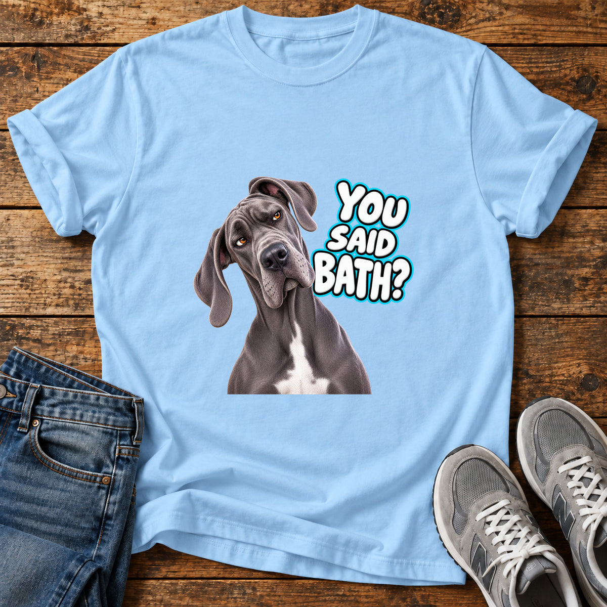 You Said Bath Great Dane graphic T-shirt in Light Blue, shown on a flat-lay shirt mockup