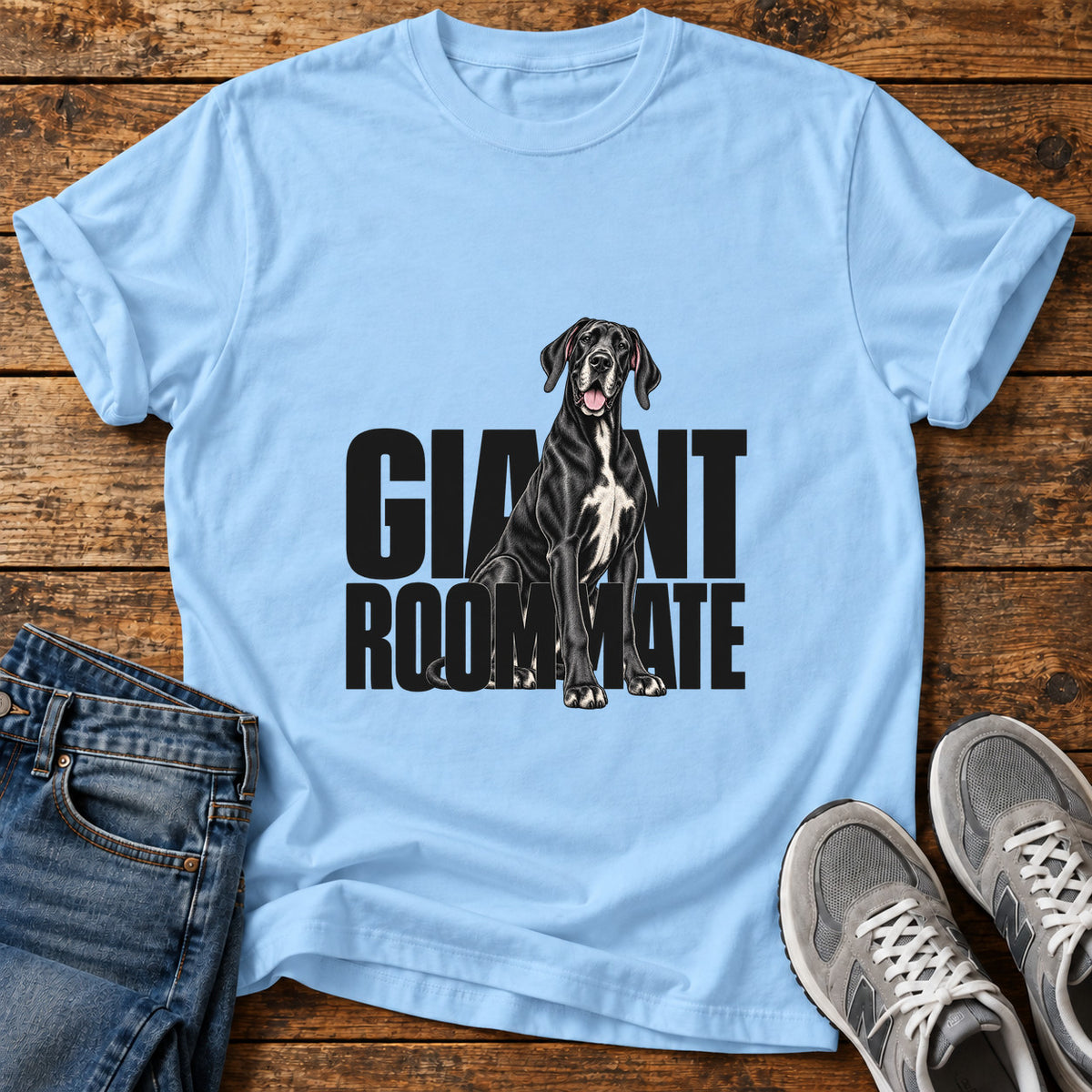 Giant Roommate Great Dane graphic T-shirt in Light Blue, shown on a flat-lay shirt mockup