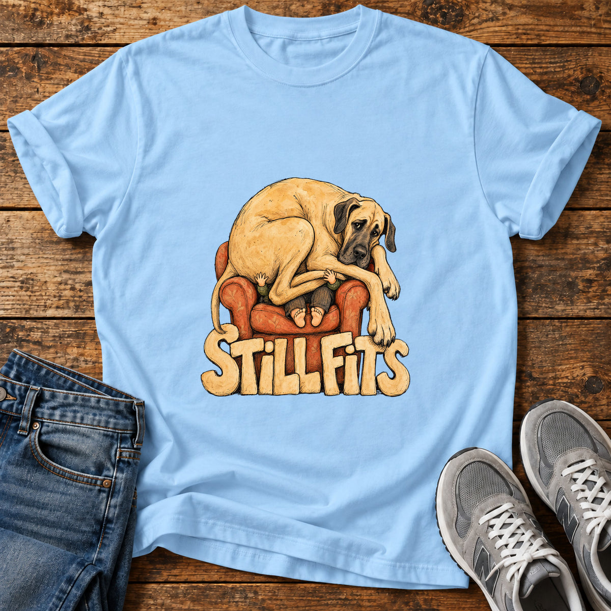 Still Fits Great Dane graphic T-shirt in Light Blue, shown on a flat-lay shirt mockup