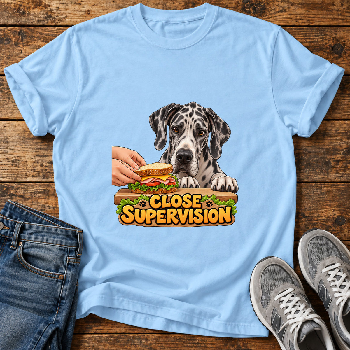 Close Supervision Great Dane graphic T-shirt in Light Blue, shown on a flat-lay shirt mockup