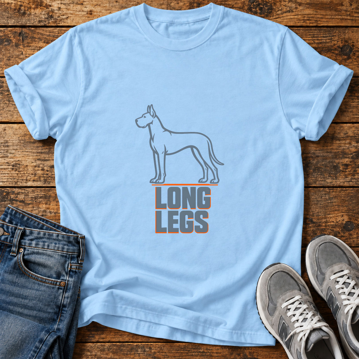 Long Legs Great Dane graphic T-shirt in Light Blue, shown on a flat-lay shirt mockup
