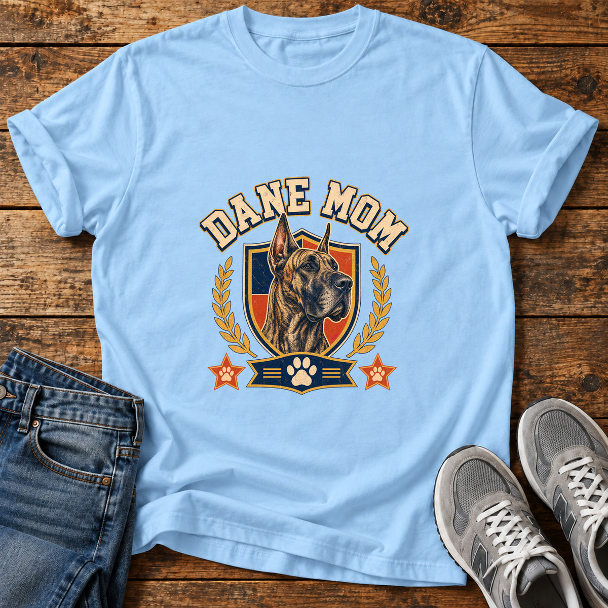 Dane Mom Great Dane graphic T-shirt in Light Blue, shown on a flat-lay shirt mockup