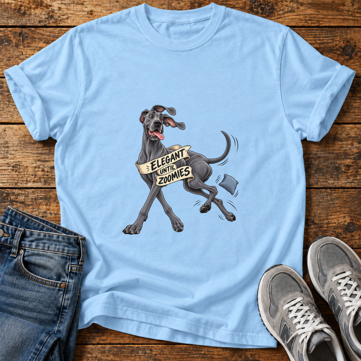 Elegant Zoomies Great Dane graphic T-shirt in Light Blue, shown on a flat-lay shirt mockup