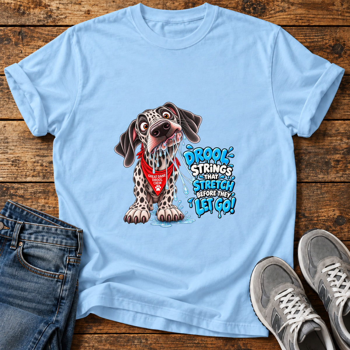Drool Strings Stretch Great Dane graphic T-shirt in Light Blue, shown on a flat-lay shirt mockup